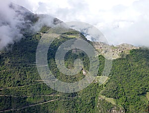 Machu picchu seen from oposite mountain putucusi photo