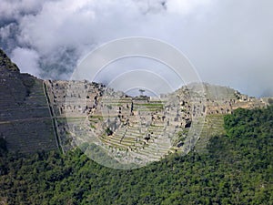 Machu picchu seen from oposite mountain putucusi photo