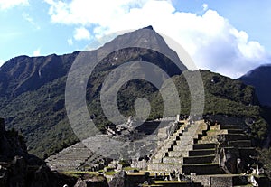 Machu Pichu ancient ruins view in late afternoon