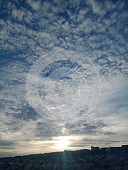 Mackerel cloud sky sunset seawall