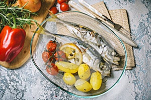 Mackerel cooked whit potatoes and tomatoes