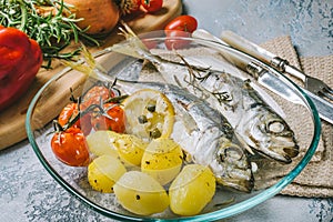Mackerel cooked whit potatoes and tomatoes photo