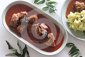 Mackerel curry prepared in central Kerala style with red chilies and Malabar tamarind