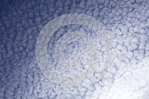 Mackerel sky on blue