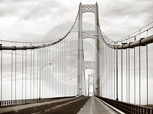 Mackinac Bridge steel, metal suspension bridge in retro sepia