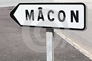 Macon city direction and road sign