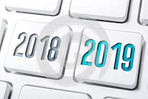 Macro Of 2 Buttons With The Year 2018 And 2019 On White Keyboard