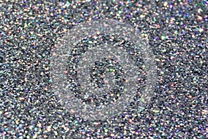 Macro abstract art background of bright silver glitter texture