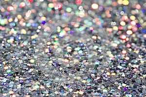 Macro abstract art background of bright silver glitter texture