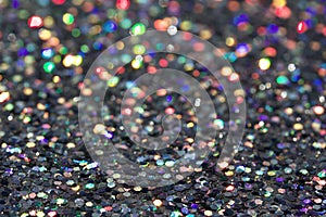 Macro abstract art background of bright silver glitter texture