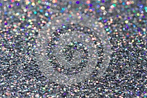 Macro abstract art background of bright silver glitter texture