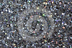 Macro abstract art background of bright silver glitter texture