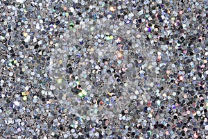 Macro abstract art background of bright silver glitter texture