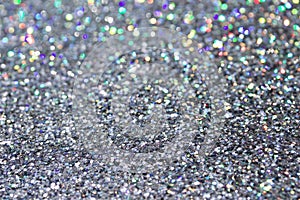 Macro abstract art background of bright silver glitter texture