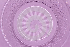 Macro abstract texture background of a lavender color round crystal glass
