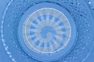 Macro abstract texture background of a light blue color round crystal glass