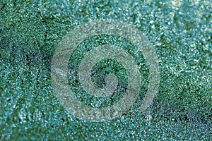 Macro abstract texture of a frosted glass window pane with natural ice crystals