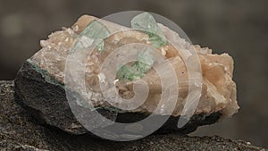 Macro of an apophyllite and stilbite mineral specimen on a black background