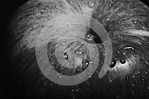 Macro apple texture with water drops on the fruit