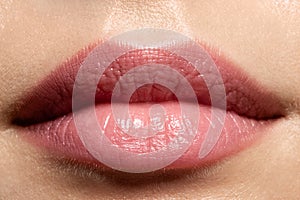 Macro beautiful woman`s full natural  lips