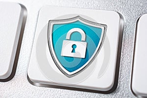 Macro Of A Blue Lock And Shield Security Icon On A Keyboard Button