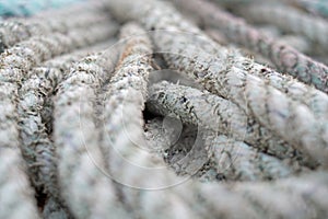 Macro, boat rope and textile with texture, nautical equipment for navigation and rigging with bundle of material. Weave