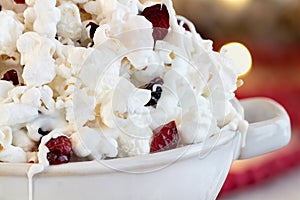 Macro of a Bowl of White Chocolate Popcorn and Cranberry Snack