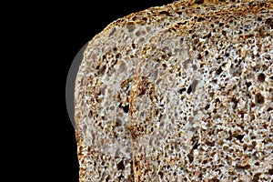 Macro brown bread slices texture background.