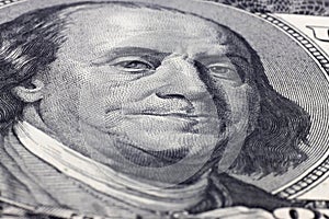 Macro close up of Ben Franklin's face on the hundred dollar bill