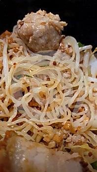 Macro, close up egg noodle with pork meat ball Thai style, delicious, signature, local food,
