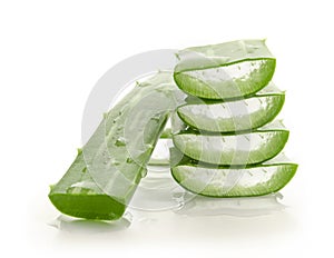 Macro or Close up Fresh Aloe vera sliced stacked, with water drops on Aloe vera isolated on white background