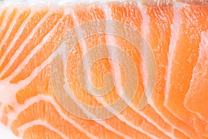 Macro close up of fresh salmon flesh.