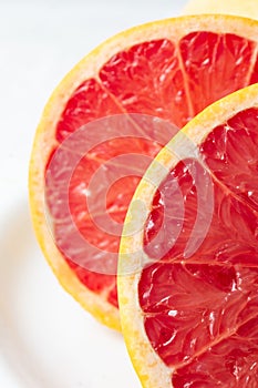 Macro close up of half a red grapefruit with selective focus,