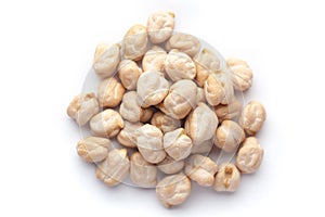 Macro Close-up of Organic chhole chana or Kabuli chana Cicer arietinum or whole white Bengal gram dal cleaned on a white