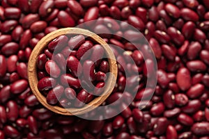 Macro Close up of Organic Rajma,  Laal Lobia  or red kidney beans dal in an earthen clay pot kulhar on the self background.