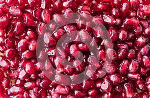 A macro close up of pomegranate arils.
