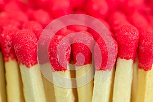 Macro close up of Red headed matches standing upright