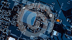 Macro Close-up Shot of Microchip, CPU Processor on Printed Circuit Board / Computer Motherboard with