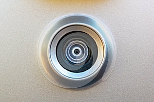 Macro close-up of a small digital camera, part of a camera image distance vision safety system on a modern drone.