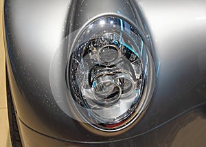 The macro close up view of sport car headlight