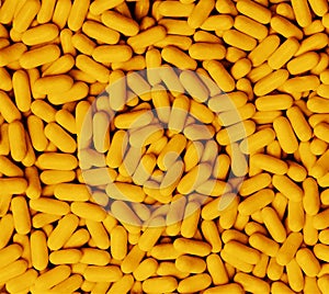 Macro closeup of orange Tic Tacs scattered