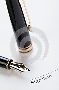 Macro closeup sign document contract pen filler