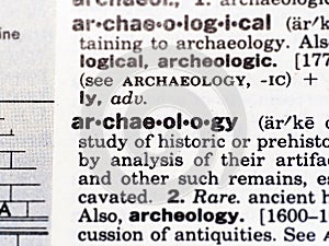 Closeup of the word archaeology in the dictionary photo