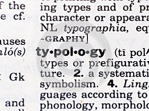 Closeup of the word typology in the dictionary photo