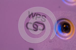 Macro closeup on WPS symbol signal connection status led light photo