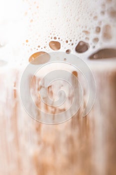 Macro coffee foam with bubbles