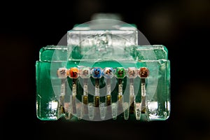 Macro cross section front angle view of RJ45 CAT6 shielded network data internet cable clear connector