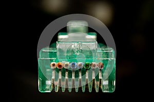 Macro cross section front angle view of RJ45 CAT6 shielded network data internet cable clear connector