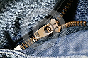 Macro of a denim zipper