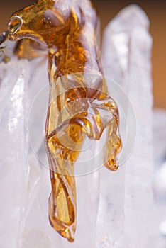 Macro detail of melted cannabis oil concentrate aka shatter